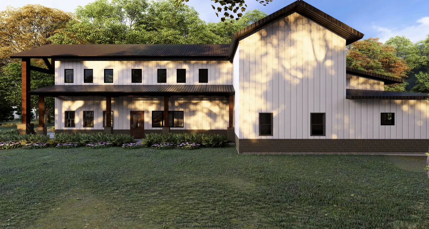 Side view of a modern white barndominium with black metal roof, covered front porch, landscaped yard, and wooded surroundings in a rural setting.