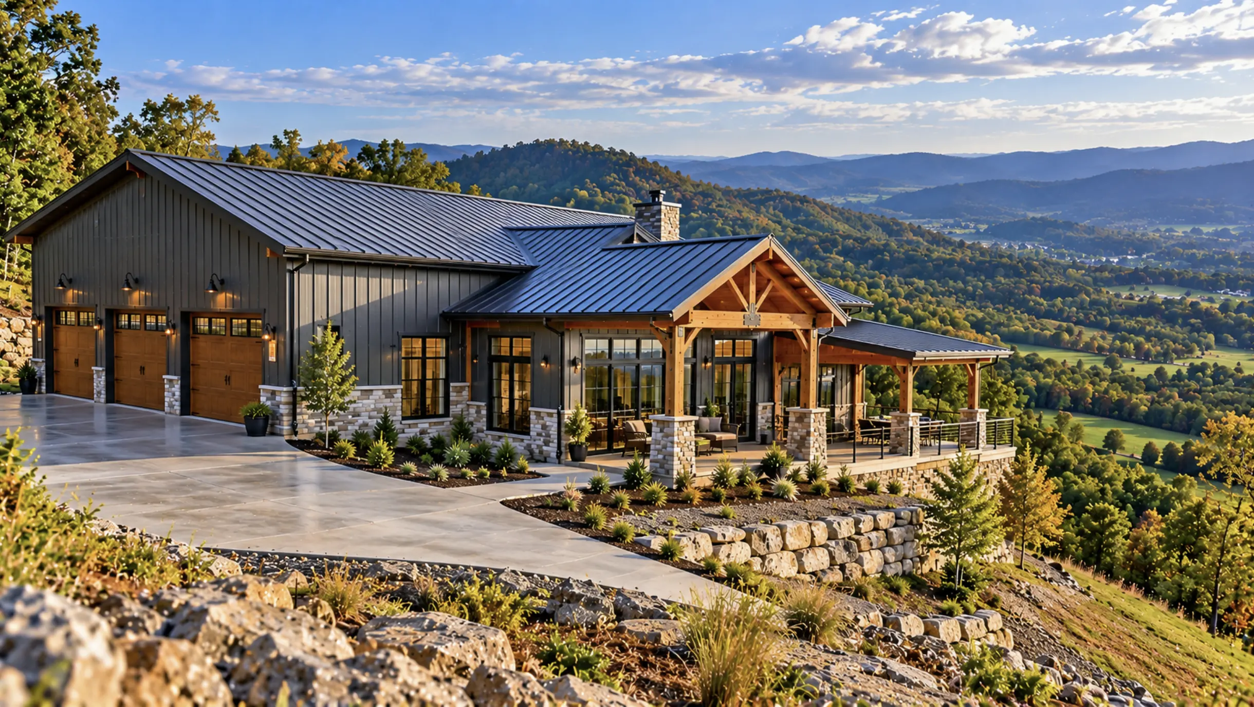 Barndominium built on rolling hillside terrain with retaining walls and graded access in Johnson City, TN.